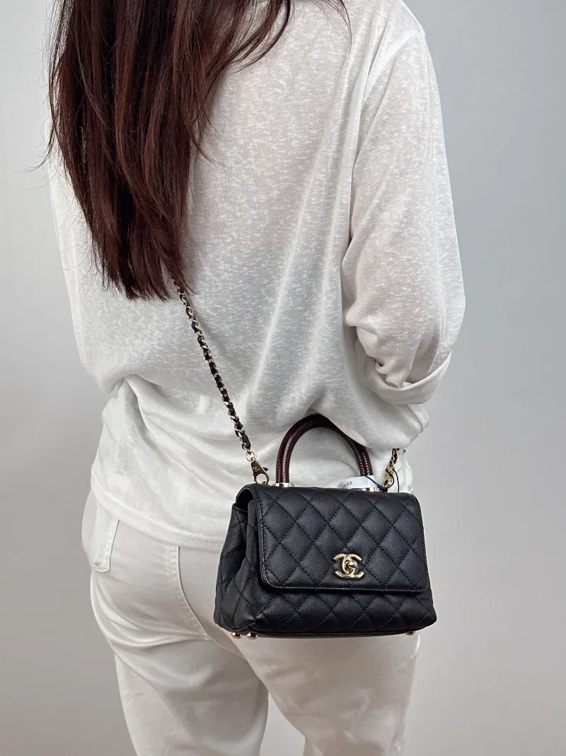Chanel Top Handle Bag Coco Handle​ Black Grained Calfskin Mini 19 × 9 × 13 cm — on-model view 1 of 2