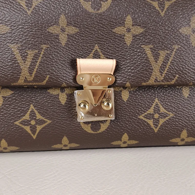 Louis Vuitton Crossbody Bag MADELEINE Monogram PVC nano 21 × 6 × 12.5 cm — detail view 1 of 11
