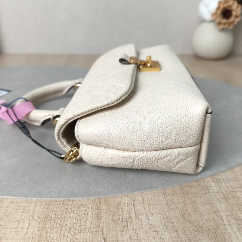Louis Vuitton Crossbody Bag MADELEINE White Empreinte Embossed Calfskinnano21 × 6 × 12.5 cm — detail view 1 of 14