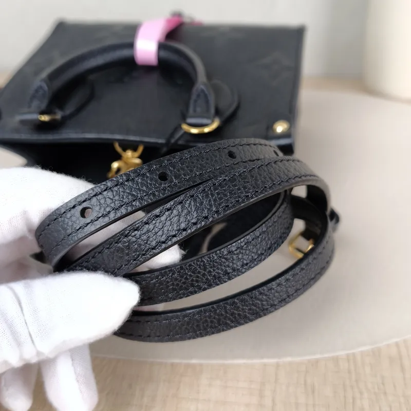 Louis Vuitton Crossbody Bag Onthego BB Black Empreinte Embossed Calfskin BB 18 × 8.5 × 15 cm — detail view 1 of 9