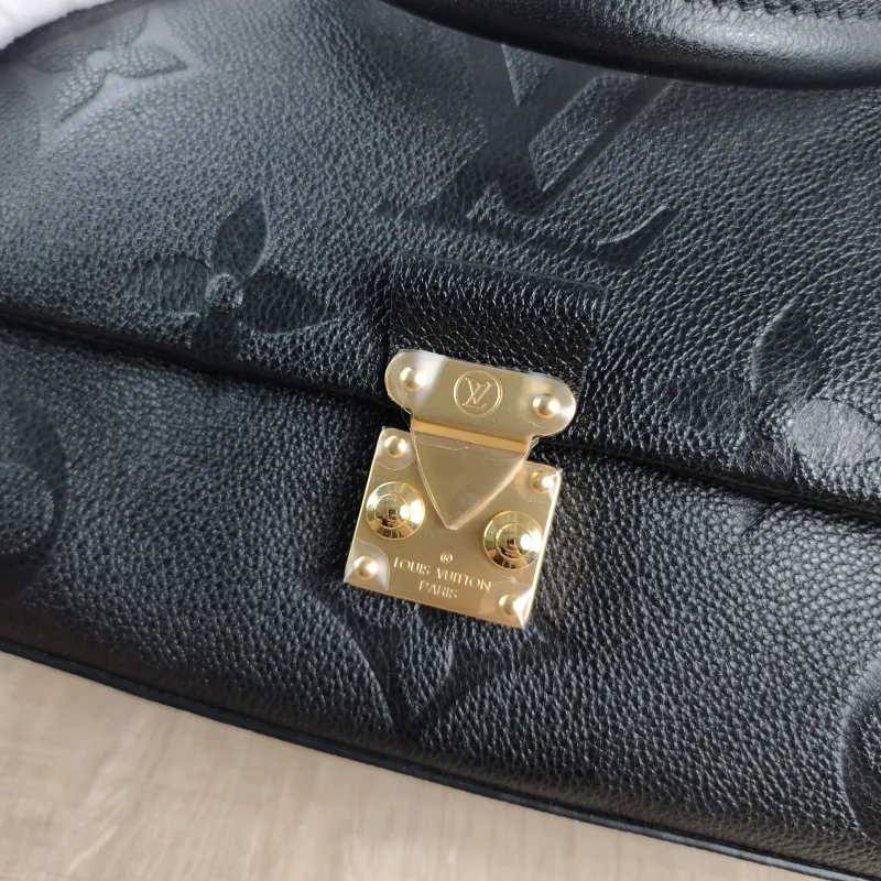 Louis Vuitton Crossbody Bag MADELEINE Black Monogram Empreinte Embossed Calfskin Medium 30 × 11 × 19.5 cm — detail view 2 of 12
