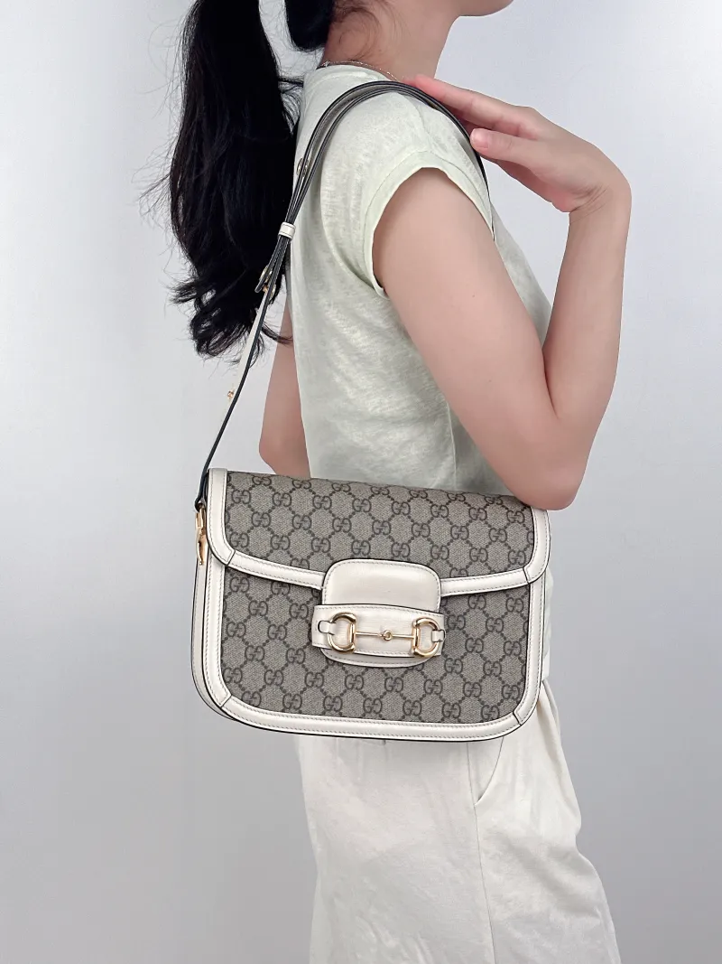 GUCCI Crossbody Bag Horsebit 1955 Horsebit Medium White Monogram PVC Medium25 × 8 × 18 cm — on-model view 3 of 3