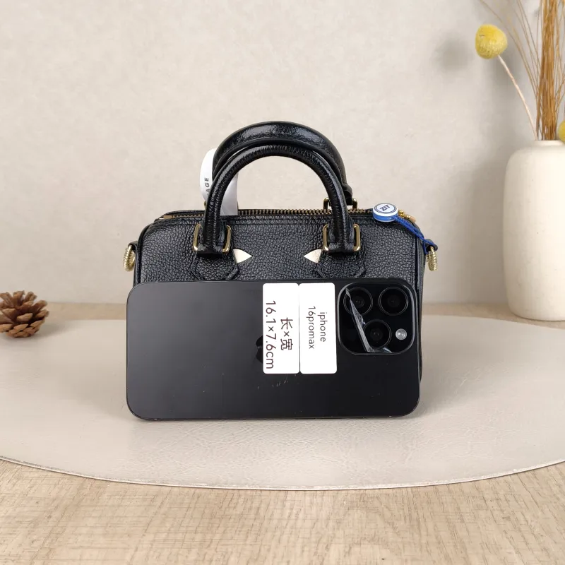 Louis Vuitton Crossbody Bag Speedy Nano Black · White Empreinte Embossed Calfskin Monogramnano16 × 7.5 × 10 cm — cover view 5 of 5