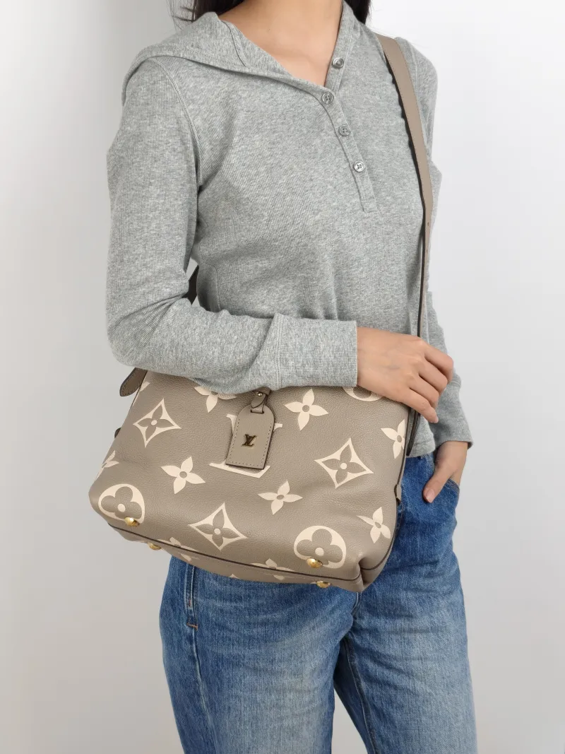 Louis Vuitton Crossbody Bag Carryall Calfskin Small 29.5 × 12 × 24 cm — on-model view 1 of 2