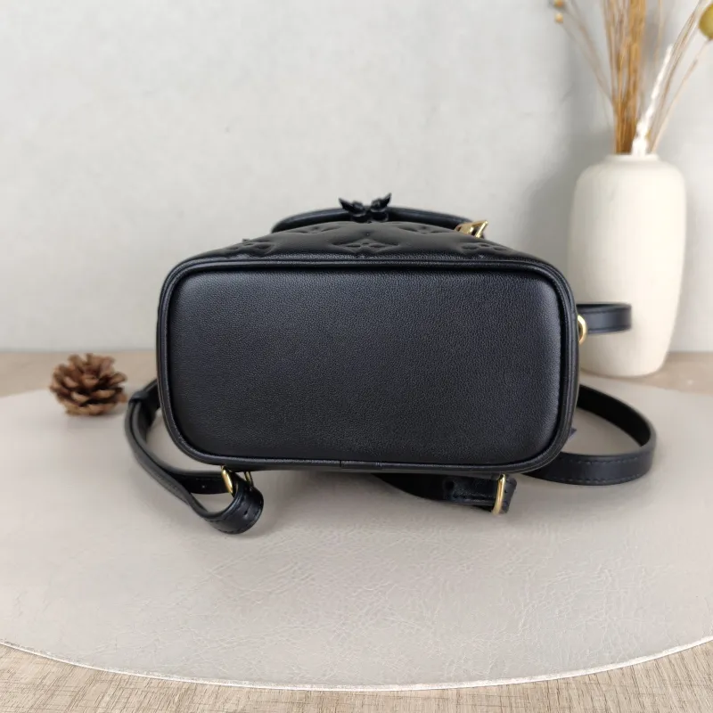 Louis Vuitton Backpack Coussin Backpack Black with Gold-Tone Hardware Lambskin Mini 15 × 7.5 × 20 cm — cover view 2 of 5
