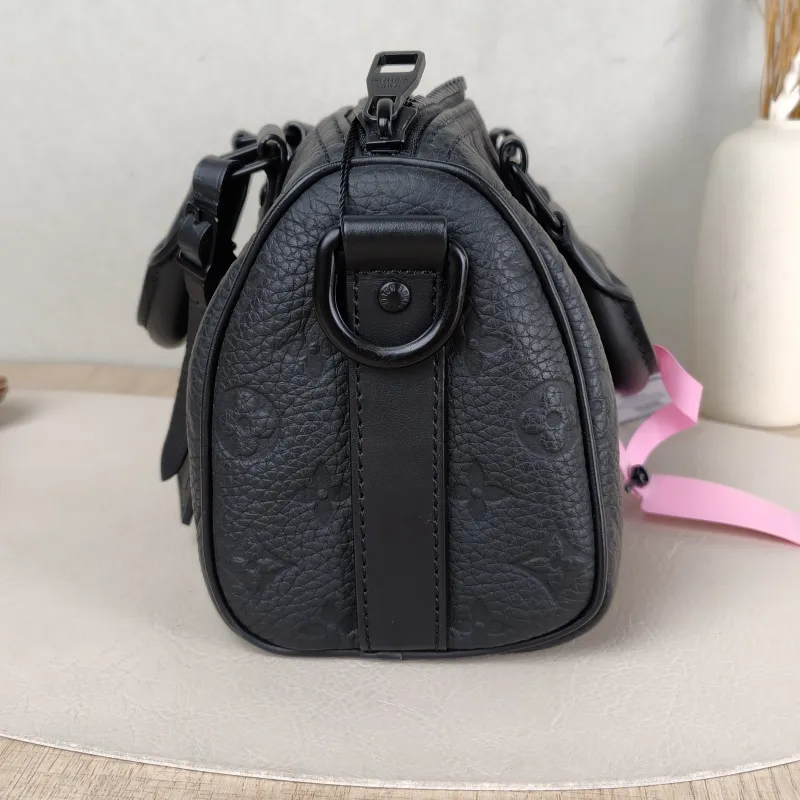 Louis Vuitton Crossbody Bag Keepall 25 Taurillon Monogram Embossed Calfskin Medium 25 × 11 × 15 cm — detail view 9 of 11