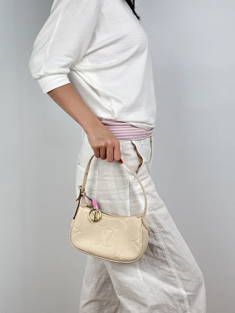 Louis Vuitton Shoulder Bag Moon White Calfskinmini20.5 × 5 × 11 cm — on-model view 2 of 3