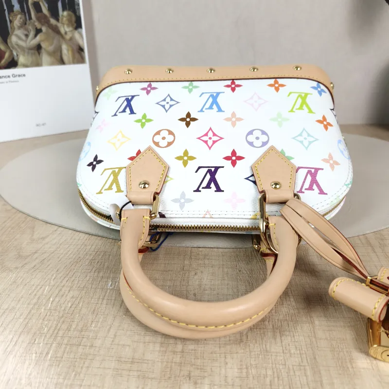 Louis Vuitton Crossbody Bag Alma BB Multicolore PVC BB 23.5 × 11.5 × 17.5 cm — detail view 1 of 11