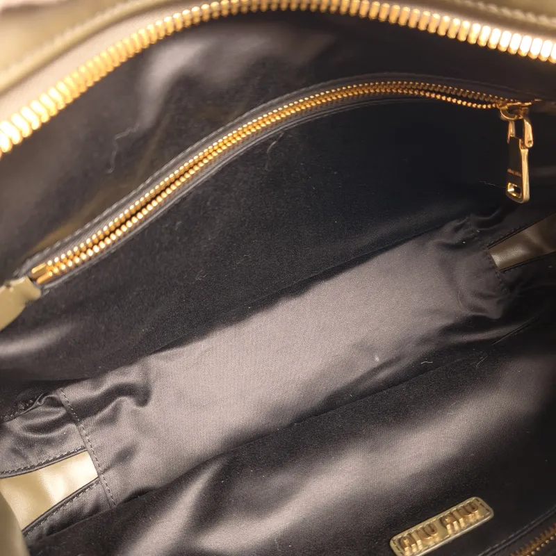 Miumiu Top Handle Bag Beau CC alfskin 34 × 10 × 23 cm — detail view 9 of 12