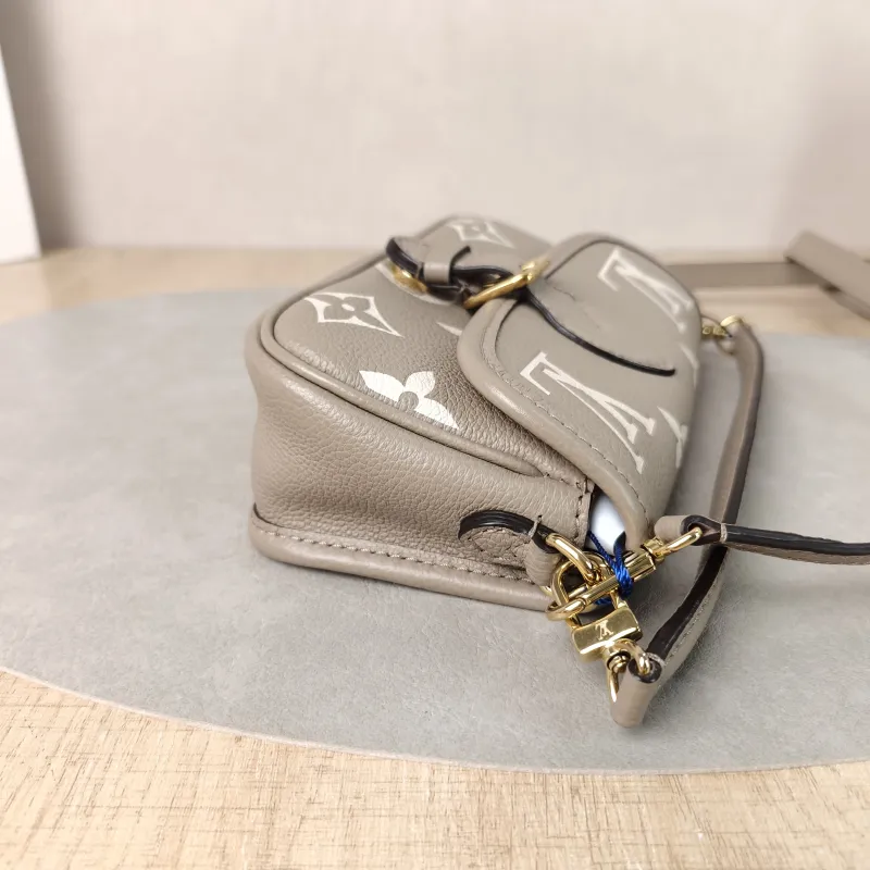 Louis Vuitton Crossbody Bag Diane Baguette Bag Empreinte Embossed Calfskinnano19 × 6 × 10.5 cm — detail view 8 of 11