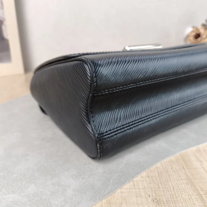 Louis Vuitton Crossbody Bag Twist Black Epi Embossed Calfskin Medium 23 × 9.5 × 17 cm — detail view 6 of 12