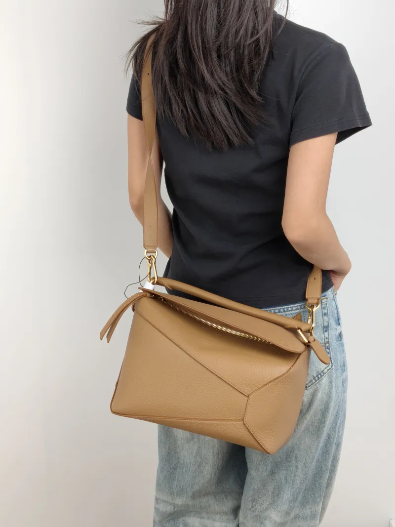 LOEWE Shoulder Bag Puzzle Brown CC alfskin Medium 29 × 14 × 19.5 cm — on-model view 3 of 3