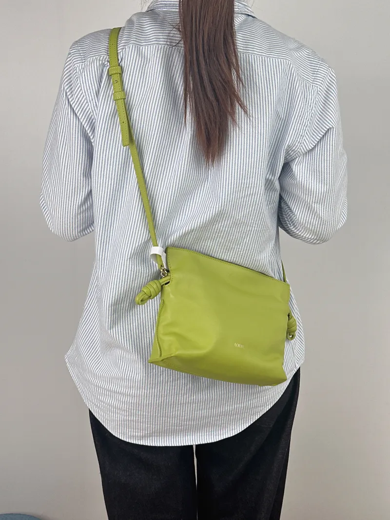 LOEWE Crossbody Bag Flamenco Green Calfskin Mini 24 × 9 × 18 cm — on-model view 1 of 2