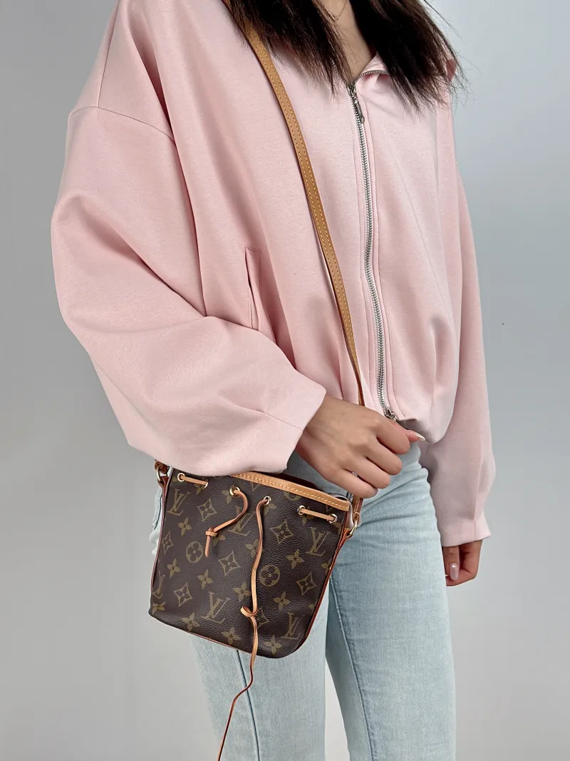 Louis Vuitton Crossbody Bag NANO NOÉ Bucket Bag Nano Monogram PVC nano 13 × 10 × 16 cm — on-model view 2 of 2