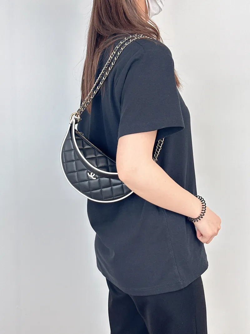 Chanel Crossbody Bag26s Top Handle Crossbody Bag Lambskin One Size22 × 6 × 15 cm — on-model view 2 of 3