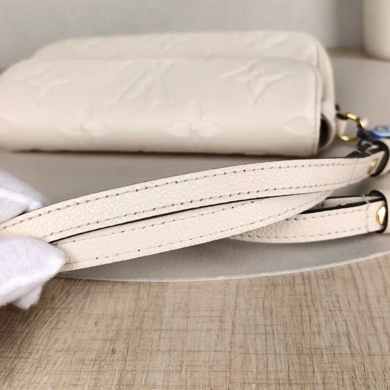 Louis Vuitton Crossbody Bag IVY White Monogram Empreinte Embossed Calfskin Small 23.5 × 4.3 × 12 cm — detail view 11 of 11