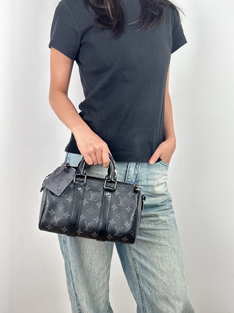 Louis Vuitton Crossbody Bag Keepall 25 PVC Medium 25 × 11 × 15 cm — on-model view 3 of 3