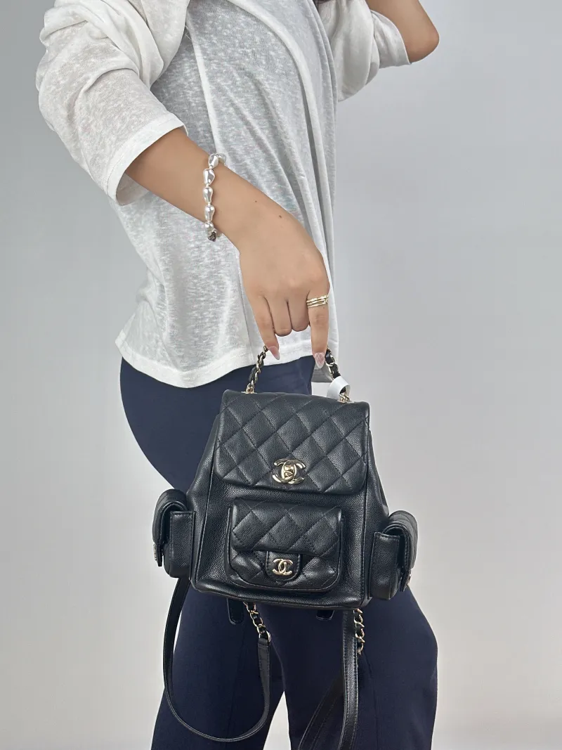 Chanel Backpackduma Black Calfskin Small18 × 9.5 × 19 cm — on-model view 2 of 3