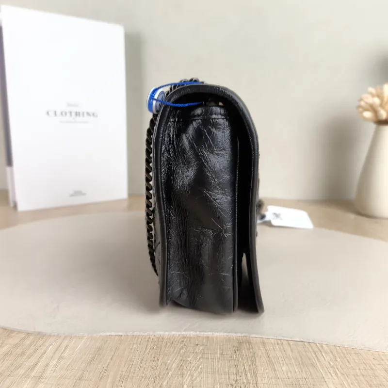 SAINT LAURENT Crossbody Bag Niki Chain Bagwoc Black Waxed Leather Calfskin Mini 19 × 5 × 16 cm — detail view 9 of 11