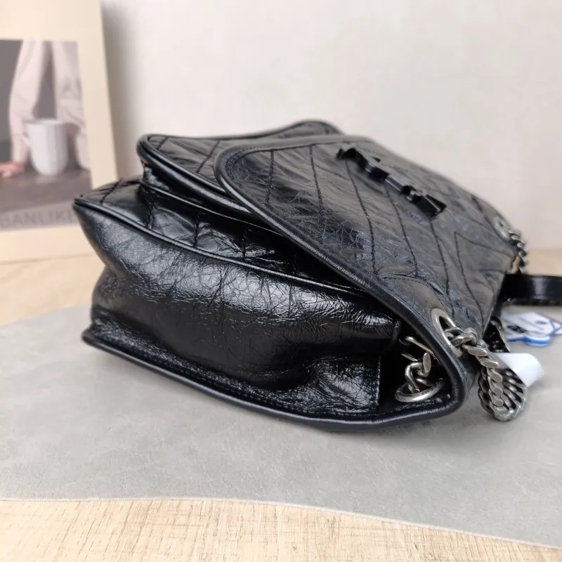 SAINT LAURENT Crossbody Bag Niki D Waxed Leather Calfskin Medium 28 × 8.5 × 20 cm — detail view 16 of 16