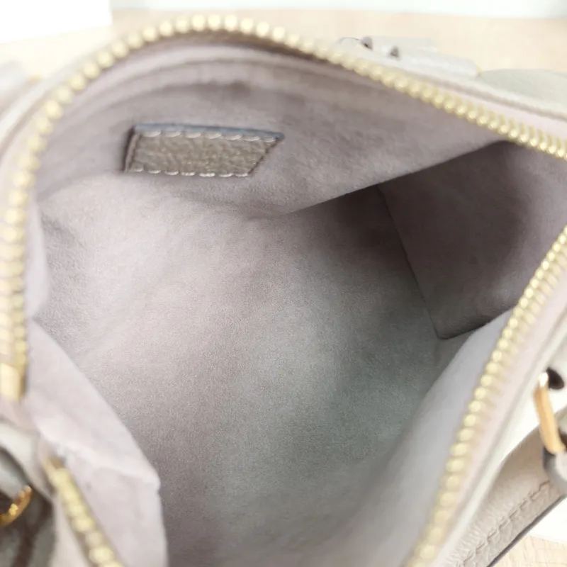 Louis Vuitton Crossbody Bag Speedy Nano · White Empreinte Embossed Calfskin Monogramnano16 × 7.5 × 10 cm — detail view 2 of 11