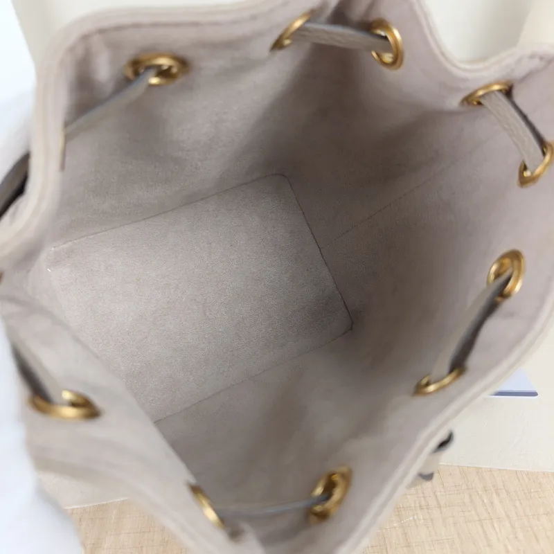 Louis Vuitton Crossbody Bag NANO NOÉ Bucket Bag Nano · White Empreinte Embossed Calfskin Monogramnano13 × 10 × 16 cm — detail view 2 of 11