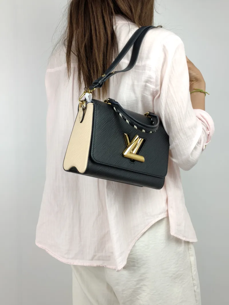 Louis Vuitton Crossbody Bag Crafty Twist Black · White Epi Embossed Calfskin Medium 23 × 9.5 × 17 cm — on-model view 1 of 3