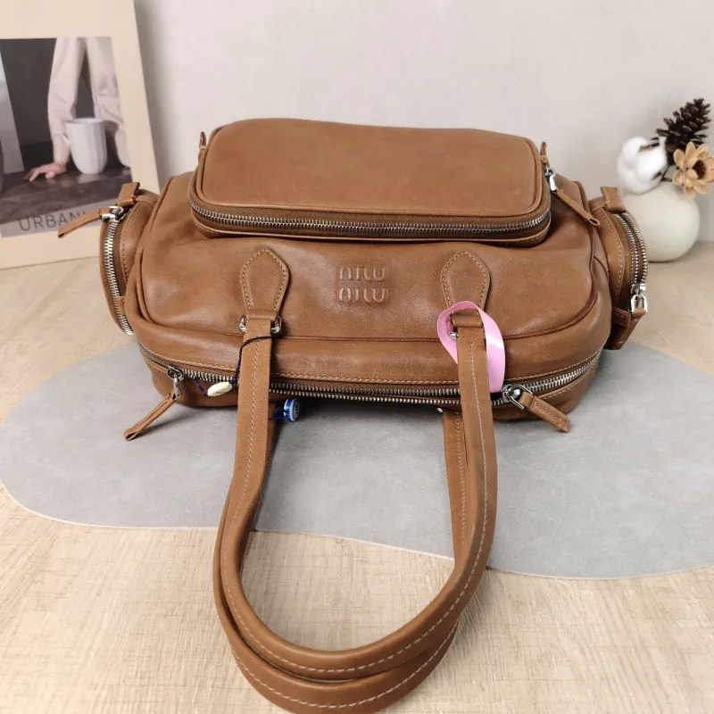 Miumiu Top Handle Bag Pocket Top Handle Bag Caramel SL ambskin One Size 32 × 14 × 22 cm — detail view 13 of 13