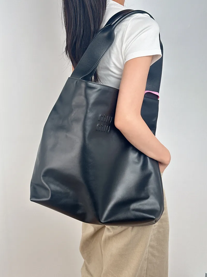 Miumiu Shoulder Bag Shoulder Bag Black Calfskin One Size 38 × 11 × 38 cm — on-model view 1 of 2