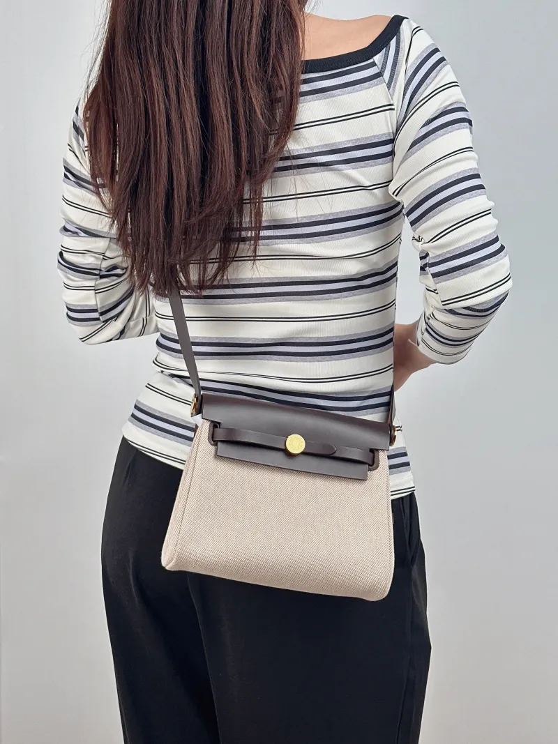 Hermès Crossbody Bag Herbag Zip 20 Beige Canvas Mini 20.5 × 7 × 16.5 cm k — on-model view 1 of 2