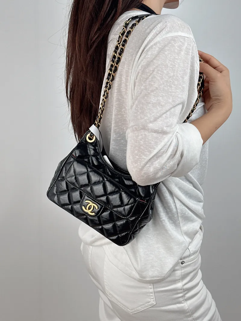Chanel Crossbody Bag HOBO Black Waxed Leather Calfskin Small 19 × 6 × 17 cm — on-model view 2 of 2