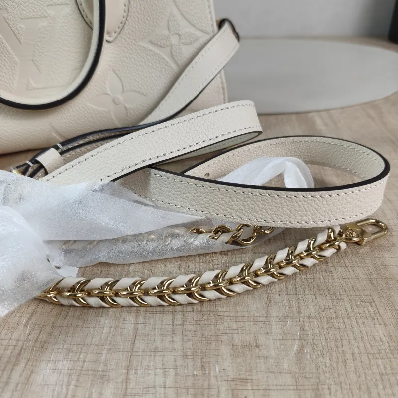 Louis Vuitton Crossbody Bag Onthego East West Two Straps White Empreinte Embossed Calfskin Small 25 × 10 × 13 cm — detail view 2 of 13