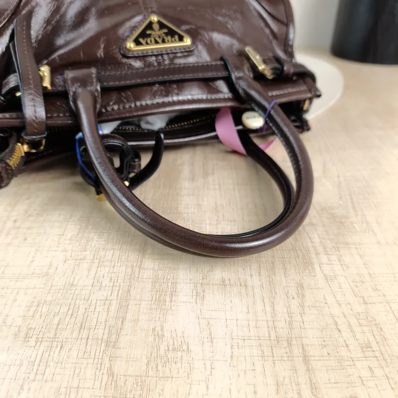 PRADA Top Handle Bag Bonnie Soft Lux Brown Waxed Leather Mini 23.5 × 9 × 12 cm — detail view 2 of 13