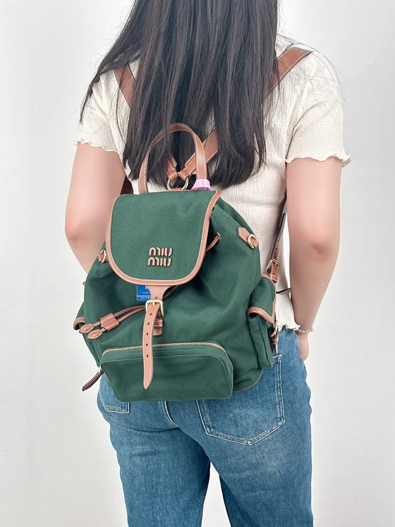 Miumiu Backpack Backpack Green Canvas Large25 × 14 × 25 cm — on-model view 2 of 3