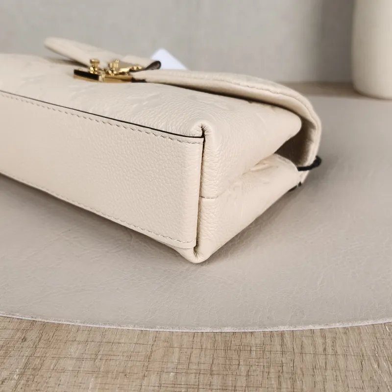 Louis Vuitton Crossbody Bag MADELEINE White Empreinte Embossed Calfskinnano21 × 6 × 12.5 cm — detail view 10 of 11