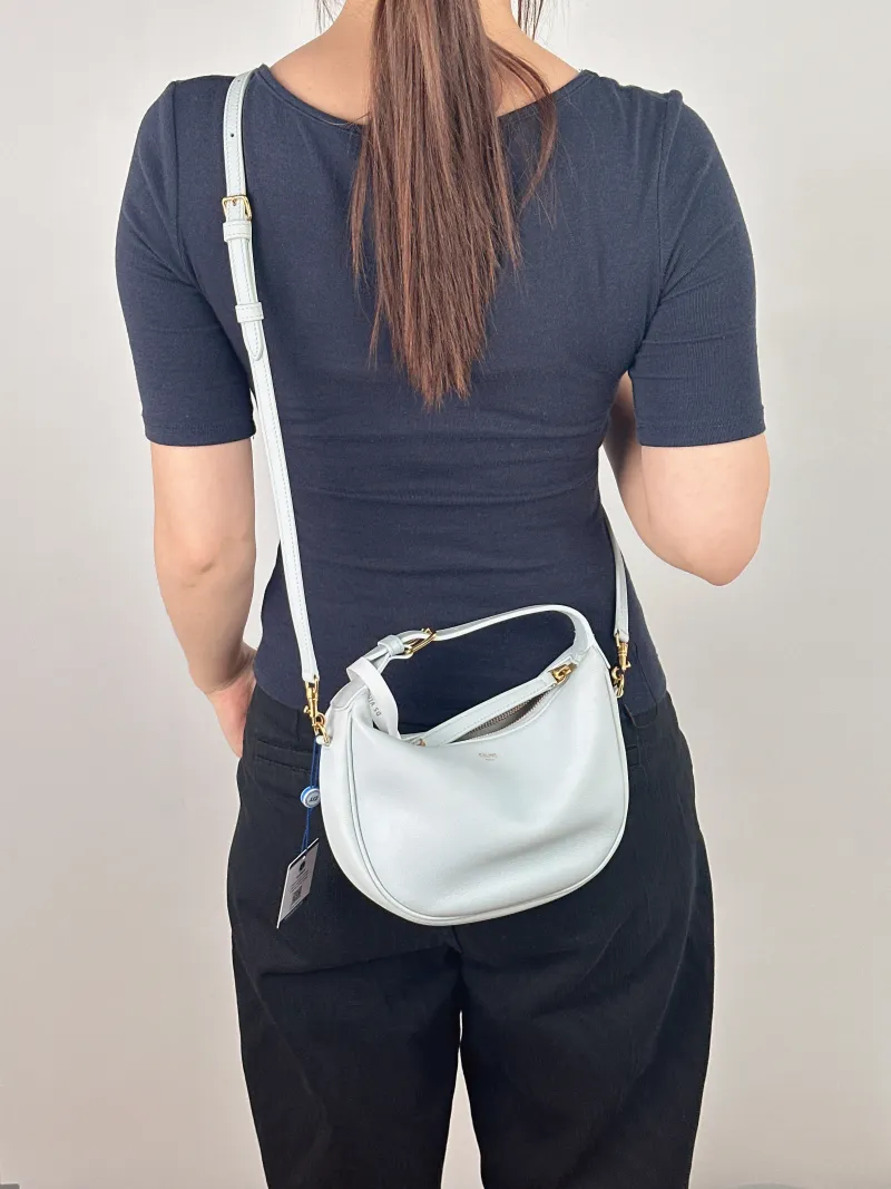 CELINE Crossbody Bag TEEN LULU hobo Blue Calfskin Small 21 × 5 × 24 cm — on-model view 2 of 2