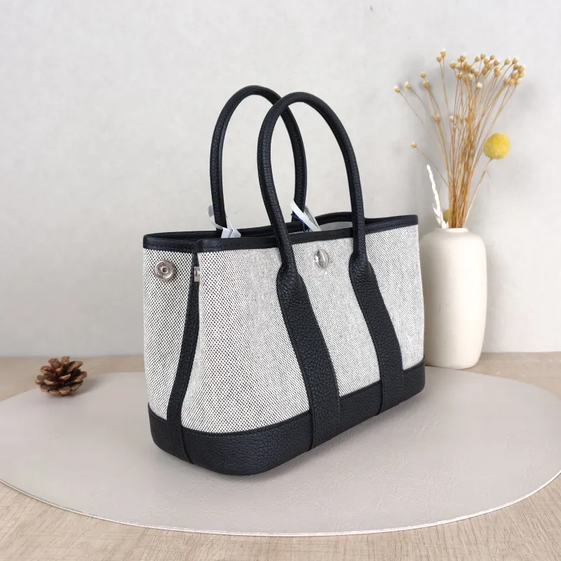 Hermès Top Handle Bag Neo Garden 23 Mini Black · Beige Canvas · Negonda Calfskinmini23 × 10 × 16 cm — cover view 2 of 6