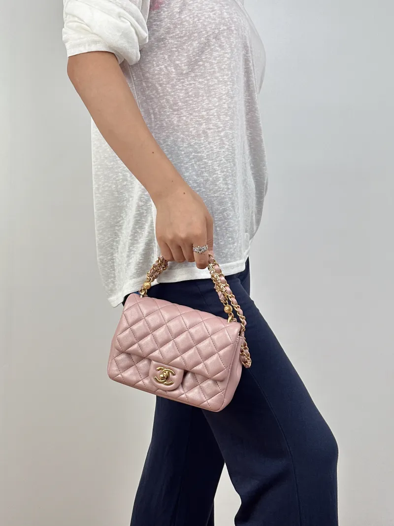 Chanel Crossbody Bag24p Pearl Pink Lambskinmini17 × 5 × 13 cm — on-model view 2 of 3