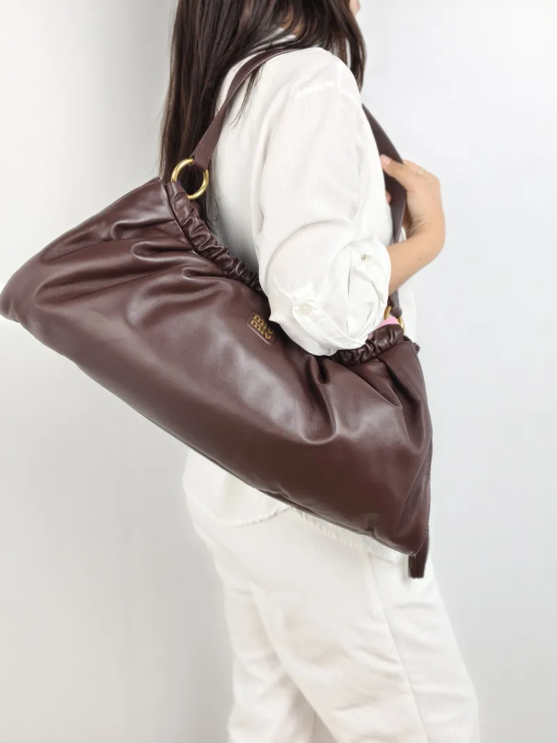 Miumiu Shoulder Bag Joie Shoulder Bag Lambskin 52 × 9 × 23 cm — on-model view 2 of 2