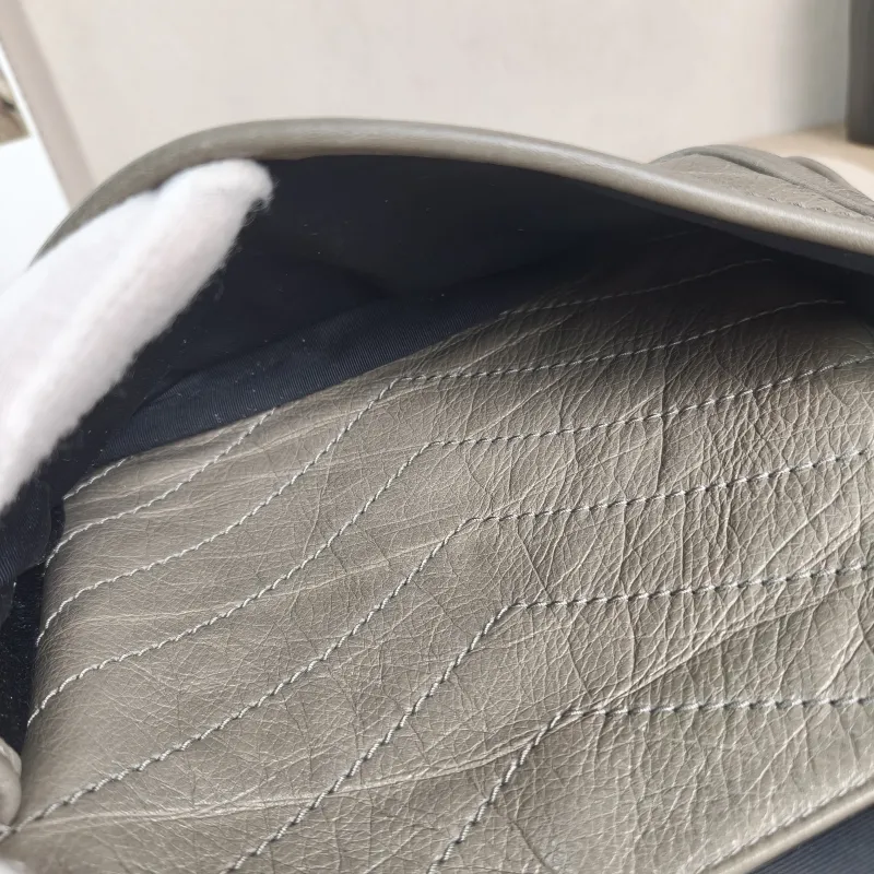 SAINT LAURENT Crossbody Bag Niki D Waxed Leather Medium 28 × 8.5 × 20 cm — detail view 7 of 12