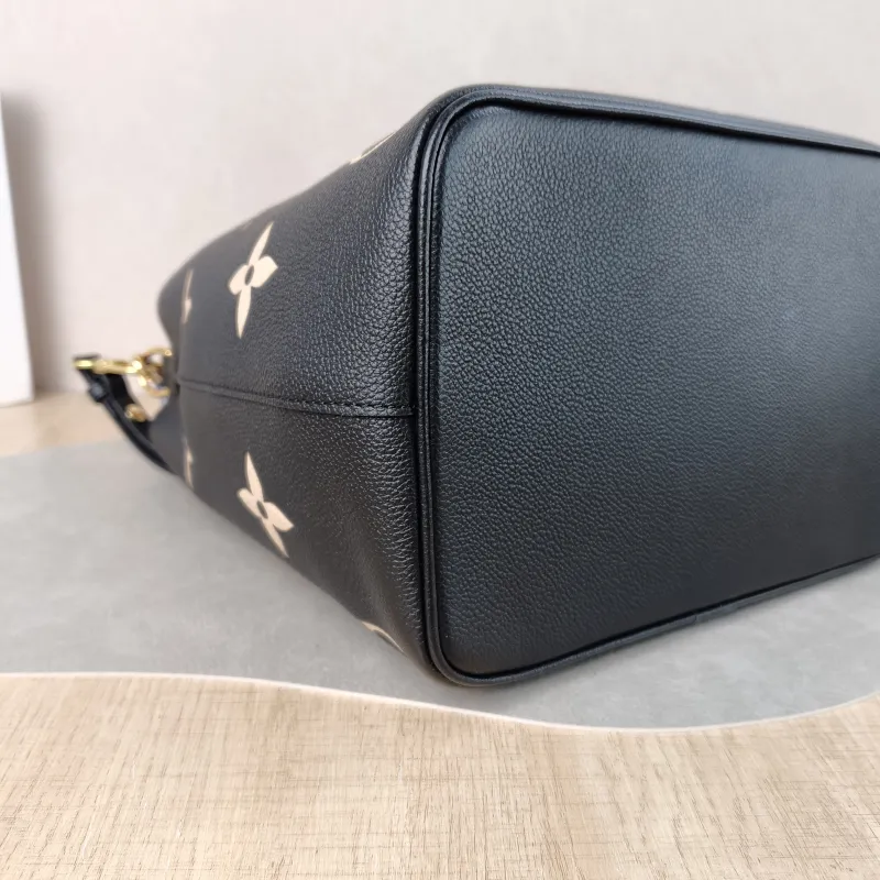 Louis Vuitton Shoulder Bag NÉONOÉ Bucket Bag Black · White Monogram Empreinte Embossed Calfskin Medium 26 × 17.5 × 26 cm — detail view 10 of 14