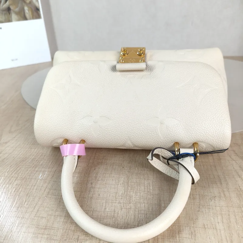 Louis Vuitton Crossbody Bag MADELEINE Beige Monogram Empreinte Embossed Calfskin BB 24 × 8.5 × 17 cm — detail view 3 of 12