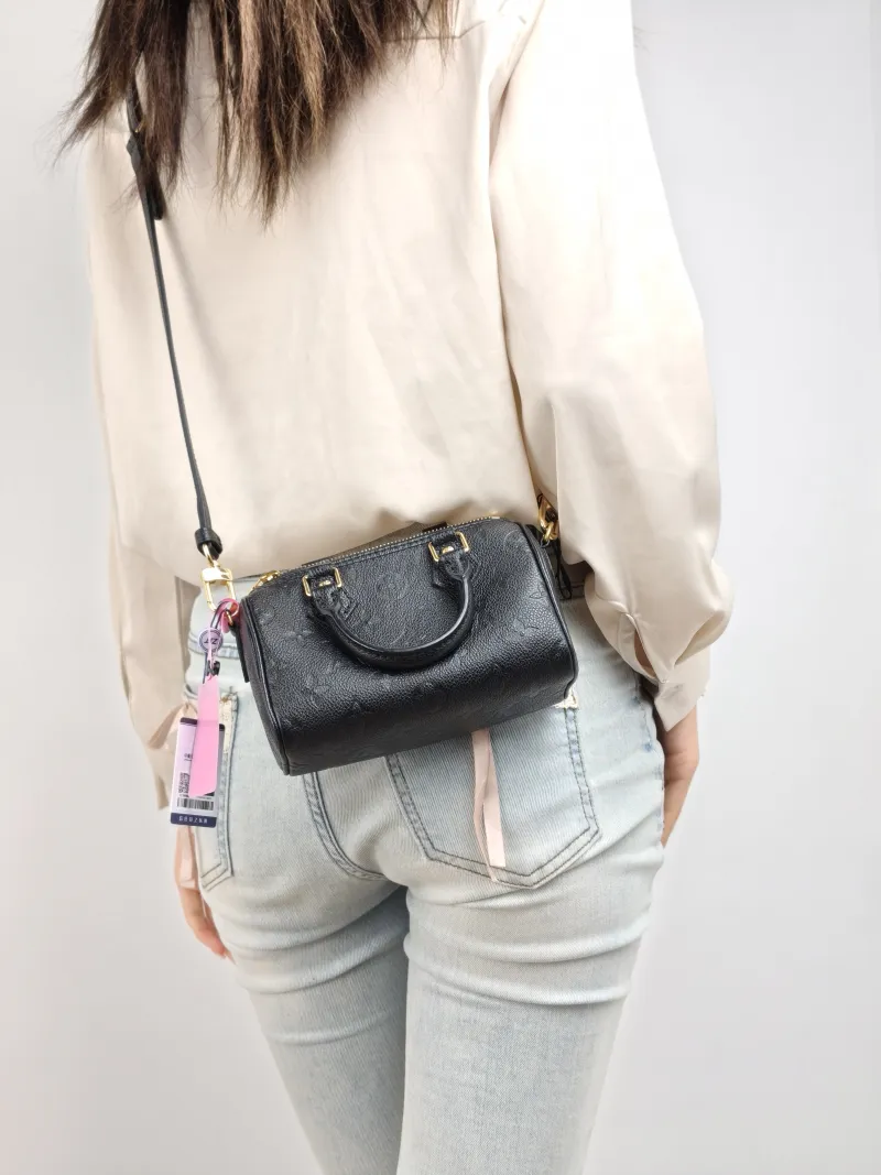 Louis Vuitton Crossbody Bag Speedy Nano Black Monogram Empreinte Embossed Calfskin nano 16 × 7.5 × 10 cm — on-model view 1 of 2