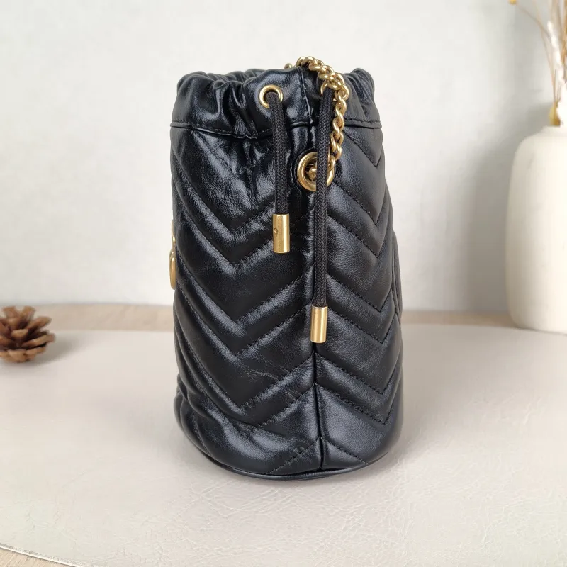 GUCCI Crossbody Bag GG Marmont Marmont Bucket Bag Black with Gold-Tone Hardware Calfskinmini13 × 10 × 17.5 cm — detail view 10 of 11