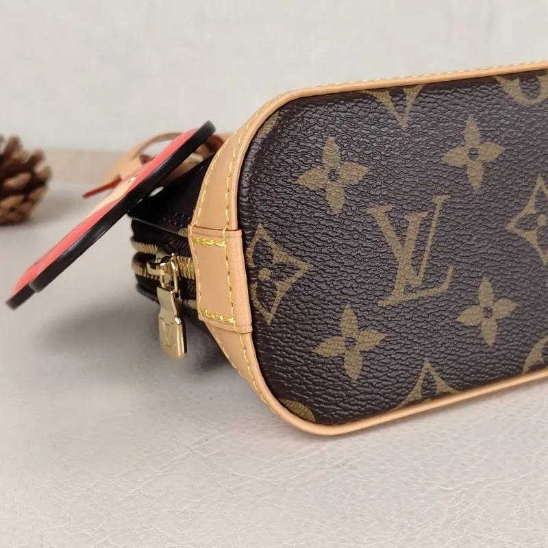 Louis Vuitton Crossbody Bag Alma Nano vivenne Monogram PVC nano 18 × 8 × 12 cm — detail view 3 of 11