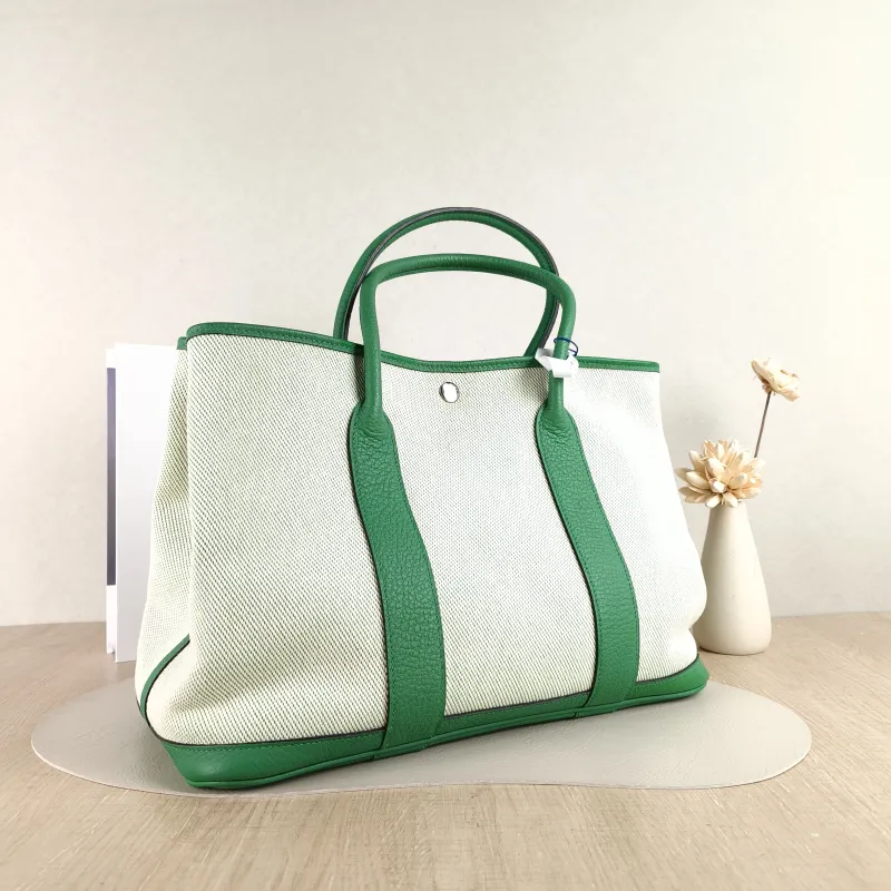 Hermès Top Handle Bag Garden Party 36 36 Beige Canvas · Calfskin Large 36 × 17 × 26 cm R — cover view 3 of 5