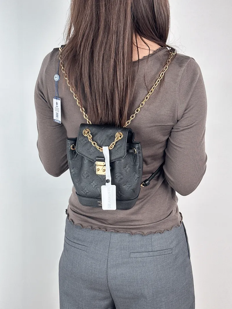 Louis Vuitton Backpack NANO NOÉ Backpack Black Calfskinnano15 × 10 × 19 cm — on-model view 1 of 2