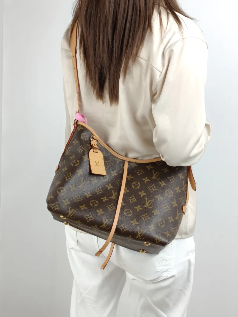 Louis Vuitton Crossbody Bag Carryall Monogram PVC Small 29 × 12 × 24 cm — on-model view 2 of 2