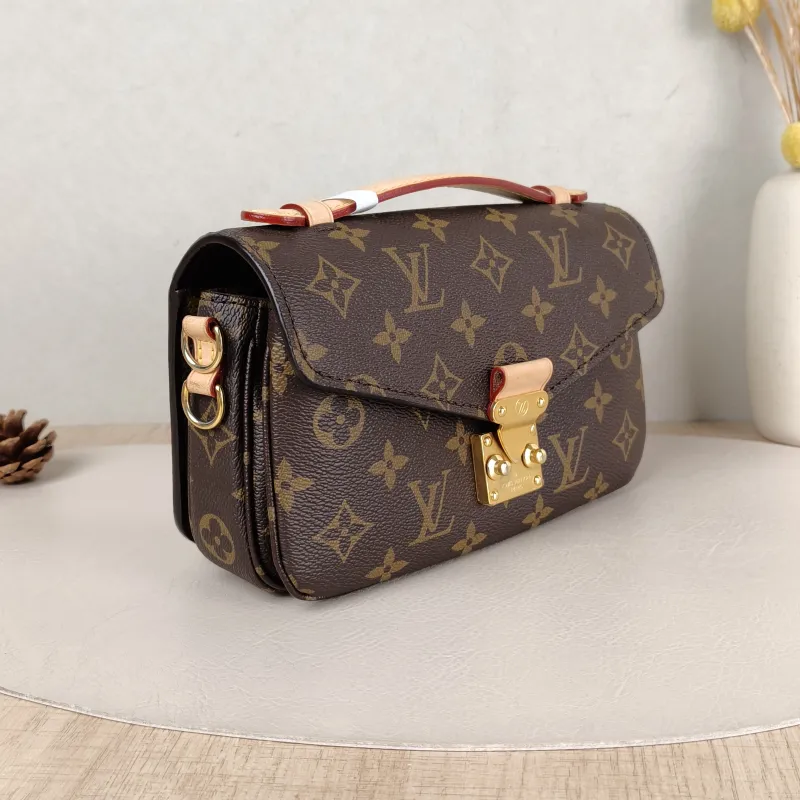 Louis Vuitton Crossbody Bag Pochette Métis East West Monogram PVC Small 21.5 × 6 × 13.5 cm — cover view 6 of 6