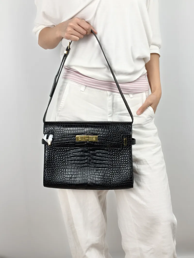 SAINT LAURENT Shoulder Bag MANHATTAN Black Embossed Calfskin Medium 29 × 7.5 × 20 cm — on-model view 1 of 2